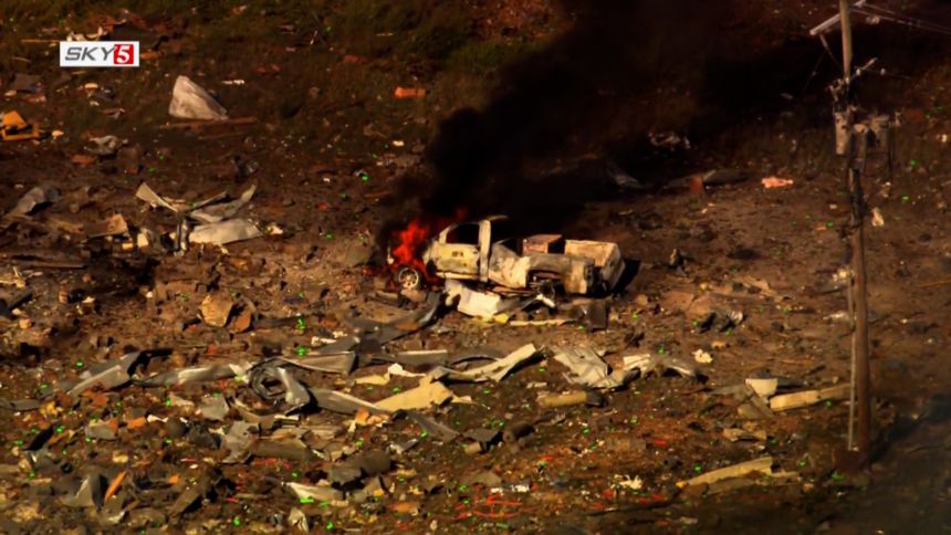 Aftermath of explosion in Hickman County TN at Tennessee TNT plant showing damaged Accurate Energetic Systems facility